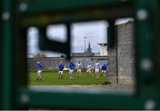8 April 2023; Laois players warm-up on the back pitch before the Joe McDonagh Cup Round 1 match between Offaly and Laois at Glenisk O'Connor Park in Tullamore, Offaly. Photo by Piaras Ó Mídheach/Sportsfile