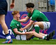 8 April 2023; Tom Murtagh of Ireland celebrates with teammate Paidi Farrell after scoring his side's third try during the U18 Six Nations Festival match between Ireland and Scotland at Energia Park in Dublin. Photo by Harry Murphy/Sportsfile