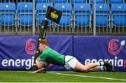 8 April 2023; Tom Murtagh of Ireland dives over to score his side's third try during the U18 Six Nations Festival match between Ireland and Scotland at Energia Park in Dublin. Photo by Harry Murphy/Sportsfile