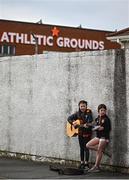 8 April 2023; Armagh supporters Gracie Clarke, age 10, left, and Aoife Rafferty, age 9, busking outside the ground before the Ulster GAA Football Senior Championship preliminary round match between Armagh and Antrim at Box-It Athletic Grounds in Armagh. Photo by Ramsey Cardy/Sportsfile