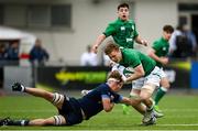 8 April 2023; Jim White of Ireland is tackled by Freddy Douglas of Scotland during the U18 Six Nations Festival match between Ireland and Scotland at Energia Park in Dublin. Photo by Harry Murphy/Sportsfile