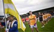 8 April 2023; Antrim captain Peter Healy leads his side in the pre-match parade before the Ulster GAA Football Senior Championship preliminary round match between Armagh and Antrim at Box-It Athletic Grounds in Armagh. Photo by Ramsey Cardy/Sportsfile