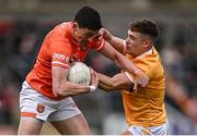 8 April 2023; Rory Grugan of Armagh in action against Eoghan McCabe of Antrim during the Ulster GAA Football Senior Championship preliminary round match between Armagh and Antrim at Box-It Athletic Grounds in Armagh. Photo by Ramsey Cardy/Sportsfile