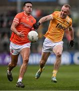 8 April 2023; Stefan Campbell of Armagh in action against Marc Jordan of Antrim during the Ulster GAA Football Senior Championship preliminary round match between Armagh and Antrim at Box-It Athletic Grounds in Armagh. Photo by Ramsey Cardy/Sportsfile