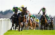 8 April 2023; Risk Belle, left, with Mark Walsh up, collides with Monbeg Park, and jockey Brian Lawless, on their way to winning the RYBO Handicap Hurdle, following a steward's enquiry, on day one of the Fairyhouse Easter Festival at Fairyhouse Racecourse in Ratoath, Meath. Photo by Seb Daly/Sportsfile