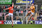 8 April 2023; Eoghan McCabe of Antrim in action against Aidan Forker of Armagh during the Ulster GAA Football Senior Championship preliminary round match between Armagh and Antrim at Box-It Athletic Grounds in Armagh. Photo by Ramsey Cardy/Sportsfile