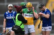 8 April 2023; Cillian Kiely of Offaly receives medical attention for an injury during the Joe McDonagh Cup Round 1 match between Offaly and Laois at Glenisk O'Connor Park in Tullamore, Offaly. Photo by Piaras Ó Mídheach/Sportsfile