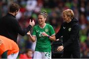 8 April 2023; Sinead Farrelly of Republic of Ireland with Republic of Ireland assistant manager Tom Elmes and Republic of Ireland manager Vera Pauw during the women's international friendly match between USA and Republic of Ireland at the Q2 Stadium in Austin, Texas. Photo by Stephen McCarthy/Sportsfile