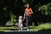 16 June 2004; Catherina McKiernan with her daughter Deirbhile, age two and a half, at the launch of this years adidas Race Series. Catherina will be defending her title in the first race - the Irish Runner Challenge - on the 4th July in the Phoenix Park, Dublin. Picture credit; Brendan Moran / SPORTSFILE