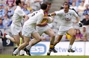 6 June 2004; Paddy Colfer, Wexford, in action against Kildare's Dermot Earley, left, Michael Foley (6) and Brian Lacey. Bank of Ireland Leinster Senior Football Championship, Wexford v Kildare, Croke Park, Dublin. Picture credit; Matt Browne / SPORTSFILE