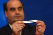 18 June 2004; Michael Hayes, Acting General Manager of the eircom League, holds the name of Finn Harps who were drawn against Longford Town at the eircom League Cup semi-final draw. FAI Office, Merrion Square, Dublin. Picture credit; Pat Murphy / SPORTSFILE