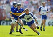 6 June 2004; Eoin McGrath, Waterford, in action against Thomas Costello, Tipperary. Guinness Munster Senior Hurling Championship semi-final, Tipperary v Waterford, Pairc Ui Chaoimh, Cork. Picture credit; Brendan Moran / SPORTSFILE
