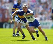 6 June 2004; Eoin McGrath, Waterford, in action against Thomas Costello, Tipperary. Guinness Munster Senior Hurling Championship semi-final, Tipperary v Waterford, Pairc Ui Chaoimh, Cork. Picture credit; Brendan Moran / SPORTSFILE