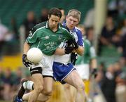 13 June 2004; Andrew Bready, Limerick, in action against Larunce Hurney, Waterford. Munster Junior Football Championship Semi-Final, Limerick v Waterford, Gaelic Grounds, Limerick. Picture credit; Pat Murphy / SPORTSFILE