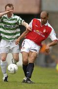 18 June 2004; Paul Osam, St. Patrick's Athletic, in action against Trevor Molloy, Shamrock Rovers. eircom league, Premier Division, Shamrock Rovers v St. Patrick's Athletic, Richmond Park, Dublin. Picture credit; Brian Lawless / SPORTSFILE