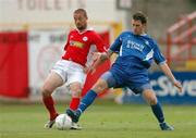 18 June 2004; Dave Rogers, Shelbourne, in action against Daryl Murphy, Waterford United. eircom league, Premier Division, Shelbourne v Waterford United, Tolka Park, Dublin. Picture credit; David Maher / SPORTSFILE