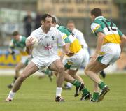 12 June 2004; Dermot Earley, Kildare, in action against Niall McNamee and Ciaran McManus (12), Offaly. Bank of Ireland Football Championship Qualifier, Round 1, Kildare v Offaly, St. Conleth's Park, Newbridge, Co. Kildare. Picture credit; Brendan Moran / SPORTSFILE