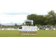 12 June 2004; The Kildare defence, from left, Enda Murphy, Michael Foley, Glenn Ryan, Damien Hendy, Eamonn Callaghan, Andrew McLoughlin and Rob McCabe, stand together for the National Anthem before the game. Bank of Ireland Football Championship Qualifier, Round 1, Kildare v Offaly, St. Conleth's Park, Newbridge, Co. Kildare. Picture credit; Brendan Moran / SPORTSFILE