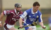 19 June 2004; Cyril Cuddy, Laois, in action against Darren McCormack, Westmeath. Guinness All-Ireland Hurling Championship Qualifier, Laois v Westmeath, O'Moore Park, Portlaoise, Co. Laois. Picture credit; Damien Eagers / SPORTSFILE