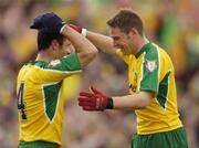 20 June 2004; Donegal's Brendan Boyle and Damien Diver, 4, celebrate after victory over Tyrone. Bank of Ireland Ulster Senior Football Championship Semi-Final, Donegal v Tyrone, St. Tighernach's Park, Clones, Co. Monaghan. Picture credit; Damien Eagers / SPORTSFILE