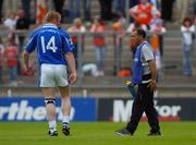 13 June 2004; Cavan manager Eamonn Coleman issues instructions to Cavan player Dermot McCabe during the match. Bank of Ireland Ulster Senior Football Championship Semi-Final, Cavan v Armagh, St. Tighernach's Park, Clones, Co. Monaghan. Picture credit; Damien Eagers / SPORTSFILE