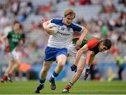 25 August 2013; Ferghal McMahon, Monaghan, in action against Eddie Doran, Mayo. Electric Ireland GAA Football All-Ireland Minor Championship Semi-Final, Mayo v Monaghan, Croke Park, Dublin. Picture credit: Ray McManus / SPORTSFILE