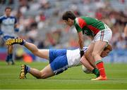 25 August 2013; Mark Magee, Monaghan, in action against Séamus Cunniffe, Mayo. Electric Ireland GAA Football All-Ireland Minor Championship Semi-Final, Mayo v Monaghan, Croke Park, Dublin. Picture credit: Ray McManus / SPORTSFILE