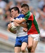 25 August 2013; Mikey Murnaghan, Monaghan, in action against Cian Hanley, Mayo. Electric Ireland GAA Football All-Ireland Minor Championship Semi-Final, Mayo v Monaghan, Croke Park, Dublin. Picture credit: Stephen McCarthy / SPORTSFILE