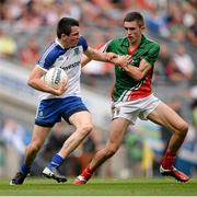 25 August 2013; Mikey Murnaghan, Monaghan, in action against Cian Hanley, Mayo. Electric Ireland GAA Football All-Ireland Minor Championship Semi-Final, Mayo v Monaghan, Croke Park, Dublin. Picture credit: Stephen McCarthy / SPORTSFILE