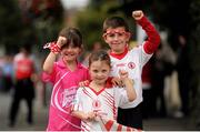 25 August 2013; Tyrone supporters, left to right, Emer, aged 8, Cara, aged 6, and Rory O'Hanlon, aged 10, from Coalisland, Co. Tyrone, on their way to the game. GAA Football All-Ireland Senior Championship Semi-Final, Mayo v Tyrone, Croke Park, Dublin. Picture credit: Dáire Brennan / SPORTSFILE