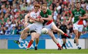 25 August 2013; Peter Harte, Tyrone, and Tom Cunniffe, Mayo, clash shoulder to shoulder in the fifth minute. Tyrone's Peter Harte subsequently left the field following this incident. GAA Football All-Ireland Senior Championship Semi-Final, Mayo v Tyrone, Croke Park, Dublin. Picture credit: Ray McManus / SPORTSFILE