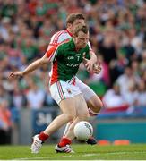 25 August 2013; Colm Boyle, Mayo, is fouled by Tyrone substitute Dermot Carlin which resulted in a penalty being awarded. GAA Football All-Ireland Senior Championship Semi-Final, Mayo v Tyrone, Croke Park, Dublin. Picture credit: Ray McManus / SPORTSFILE
