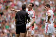 25 August 2013; Colm Cavanagh, centre, and Conor Gormley, Tyrone, remonstrate with referee Maurice Deegan. GAA Football All-Ireland Senior Championship Semi-Final, Mayo v Tyrone, Croke Park, Dublin. Picture credit: Brendan Moran / SPORTSFILE