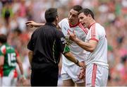 25 August 2013; Colm Cavanagh, centre, and Conor Gormley, Tyrone, remonstrate with referee Maurice Deegan. GAA Football All-Ireland Senior Championship Semi-Final, Mayo v Tyrone, Croke Park, Dublin. Picture credit: Brendan Moran / SPORTSFILE