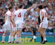 25 August 2013; Tyrone players Joe McMahon, 12, Cathal McCarron, 4, Dermot Carlin, left, and Conor Gormley remonstrate with referee Maurice Deegan after he awarded a penalty to Mayo. GAA Football All-Ireland Senior Championship Semi-Final, Mayo v Tyrone, Croke Park, Dublin. Picture credit: Ray McManus / SPORTSFILE