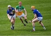 8 April 2023; Ryan Mullaney of Laois, supported by teammate Padraig Delaney, 3, gets away from Charlie Mitchell of Offaly during the Joe McDonagh Cup Round 1 match between Offaly and Laois at Glenisk O'Connor Park in Tullamore, Offaly. Photo by Piaras Ó Mídheach/Sportsfile