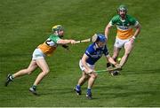 8 April 2023; Tomás Keyes of Laois in action against Jack Screeney, left, and Ben Conneely of Offaly during the Joe McDonagh Cup Round 1 match between Offaly and Laois at Glenisk O'Connor Park in Tullamore, Offaly. Photo by Piaras Ó Mídheach/Sportsfile