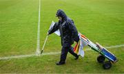9 April 2023; John Geelan, head groundsman, places the sideline flags before the Leinster GAA Football Senior Championship Round 1 match between Longford and Offaly at Glennon Brothers Pearse Park in Longford. Photo by Ray McManus/Sportsfile