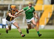 9 April 2023; Cathal O'Neill of Limerick is tackled by Richie Reid of Kilkenny during the Allianz Hurling League Final match between Kilkenny and Limerick at Páirc Ui Chaoimh in Cork. Photo by Eóin Noonan/Sportsfile