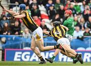 9 April 2023; Barry Nash of Limerick scores his side's first goal despite the efforts of Mikey Butler of Kilkenny during the Allianz Hurling League Final match between Kilkenny and Limerick at Páirc Ui Chaoimh in Cork. Photo by Eóin Noonan/Sportsfile