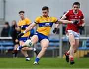 9 April 2023; Jamie Malone of Clare in action against Eoghan McSweeney of Cork during the Munster GAA Football Senior Championship Quarter-Final match between Clare and Cork at Cusack Park in Ennis, Clare. Photo by Piaras Ó Mídheach/Sportsfile