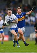 9 April 2023; Darragh Corcoran of Waterford in action against Colm O'Shaughnessy of Tipperary during the Munster GAA Football Senior Championship Quarter-Final match between Tipperary and Waterford at FBD Semple Stadium in Thurles, Tipperary. Photo by Stephen Marken/Sportsfile