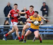 9 April 2023; Keelan Sexton of Clare in action against Daniel O'Mahony of Cork during the Munster GAA Football Senior Championship Quarter-Final match between Clare and Cork at Cusack Park in Ennis, Clare. Photo by Piaras Ó Mídheach/Sportsfile