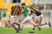 9 April 2023; Barry Murphy of Limerick is tackled by Huw Lawlor, left, and Billy Ryan of Kilkenny during the Allianz Hurling League Final match between Kilkenny and Limerick at Páirc Ui Chaoimh in Cork. Photo by Eóin Noonan/Sportsfile