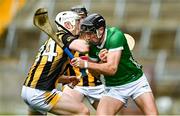 9 April 2023; Diarmaid Byrnes of Limerick is tackled by Timmy Clifford of Kilkenny during the Allianz Hurling League Final match between Kilkenny and Limerick at Páirc Ui Chaoimh in Cork. Photo by Eóin Noonan/Sportsfile