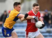 9 April 2023; Luke Fahy of Cork in action against Jamie Malone of Clare during the Munster GAA Football Senior Championship Quarter-Final match between Clare and Cork at Cusack Park in Ennis, Clare. Photo by Piaras Ó Mídheach/Sportsfile
