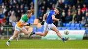 9 April 2023; Dylan Farrell of Longford in action against Lee Pearson of Offaly during the Leinster GAA Football Senior Championship Round 1 match between Longford and Offaly at Glennon Brothers Pearse Park in Longford. Photo by Ray McManus/Sportsfile