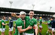 9 April 2023; Aaron Gillane, left, and Diarmaid Byrnes of Limerick aftertheir side's victory in the Allianz Hurling League Final match between Kilkenny and Limerick at Páirc Ui Chaoimh in Cork. Photo by Eóin Noonan/Sportsfile