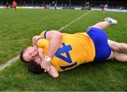 9 April 2023; Clare players Eoin Cleary and Keelan Sexton, 14, celebrate after their side's victory in the Munster GAA Football Senior Championship Quarter-Final match between Clare and Cork at Cusack Park in Ennis, Clare. Photo by Piaras Ó Mídheach/Sportsfile