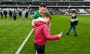 9 April 2023; Diarmaid Byrnes of Limerick poses for a selfie with a young supporter after the Allianz Hurling League Final match between Kilkenny and Limerick at Páirc Ui Chaoimh in Cork. Photo by Eóin Noonan/Sportsfile